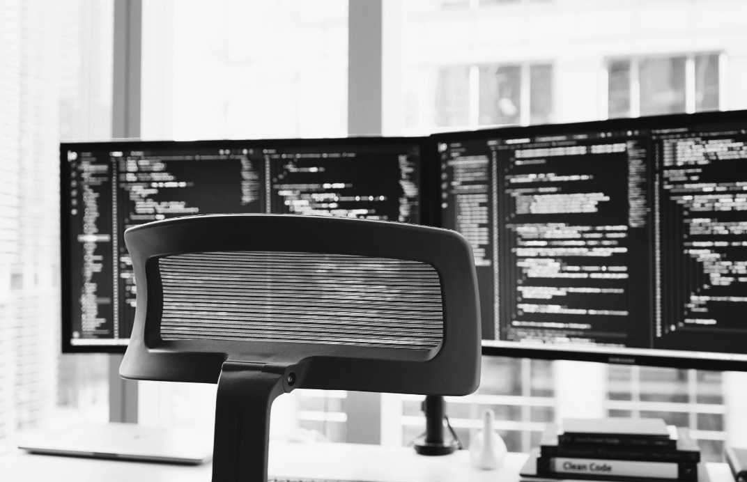 Developer workspace with dual monitors